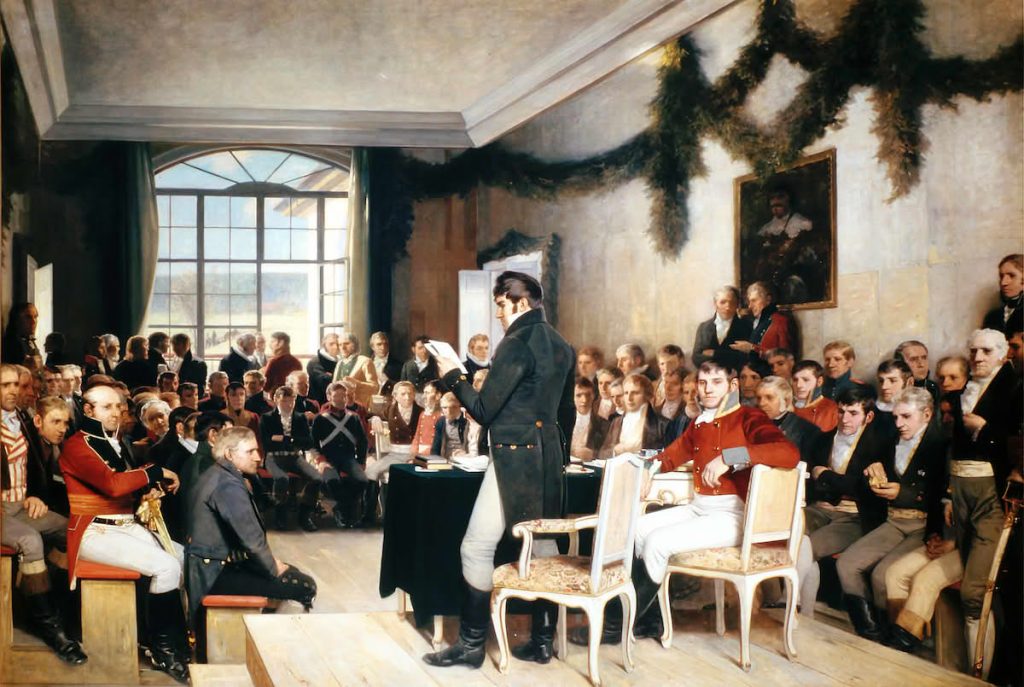 This image has an empty alt attribute; its file name is Den-norsk-grunnlov-1814-1024x687.jpeg